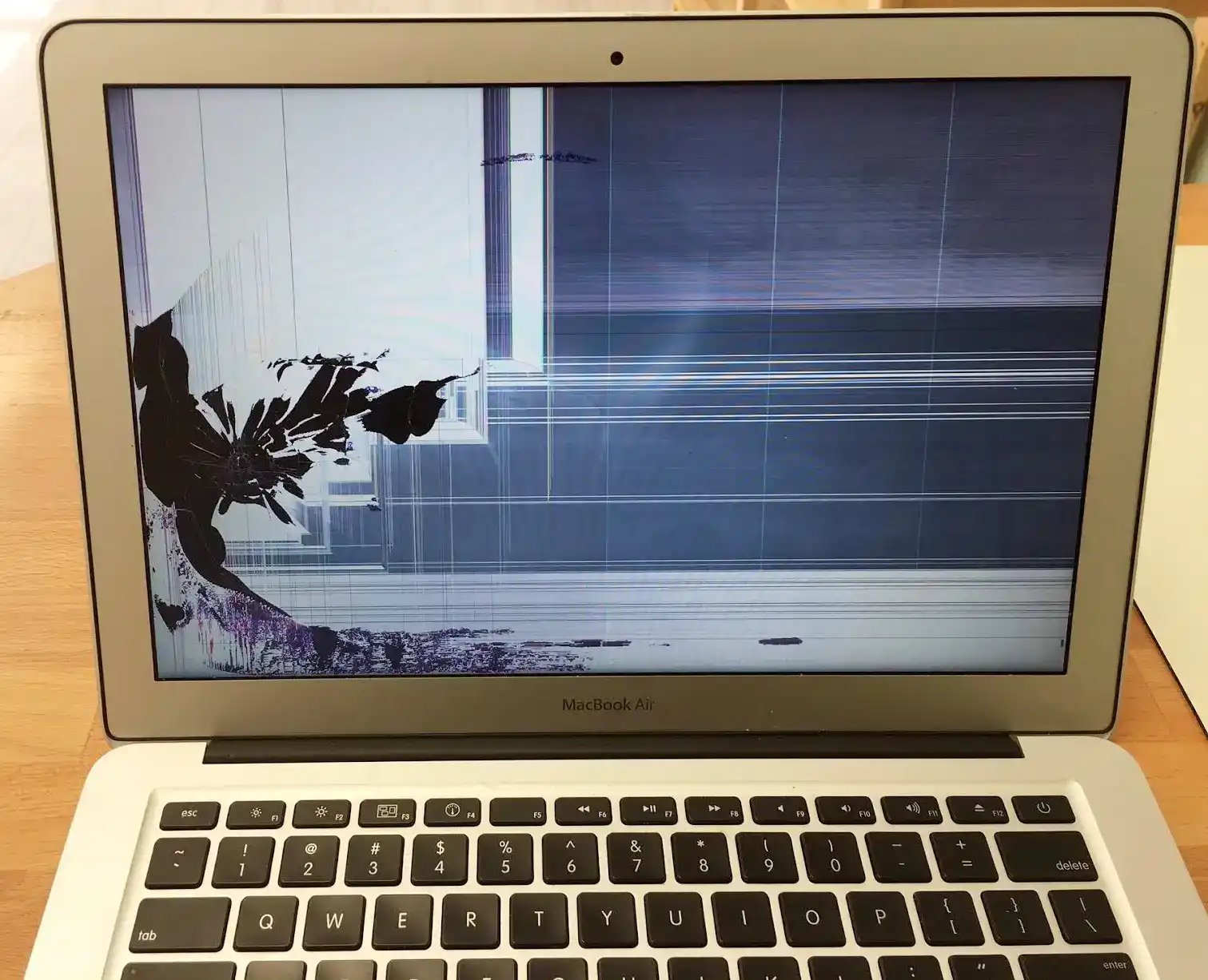Cracked MacBook Air screen before repair in Johannesburg